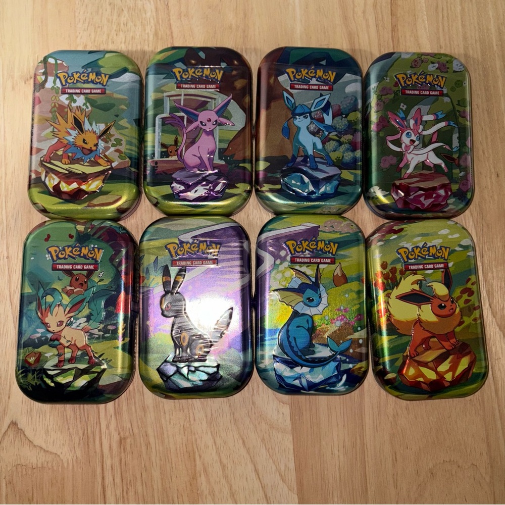 Pokémon Prismatic Evolution Mini Tins Set x 8